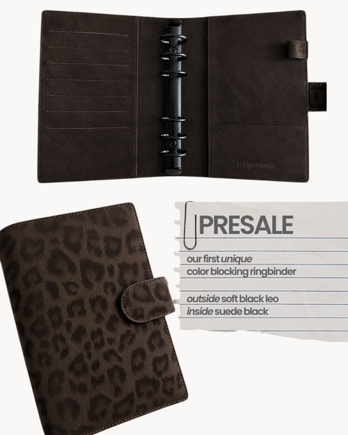 BUDGETNEEDS ™ A6 vegan leather ring binder in soft black leopard print with dark interior and black hardware.