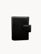 BUDGETNEEDS ™ A6 MiniFlap ring binder in black textured leather with a magnetic snap closure and pen holder.