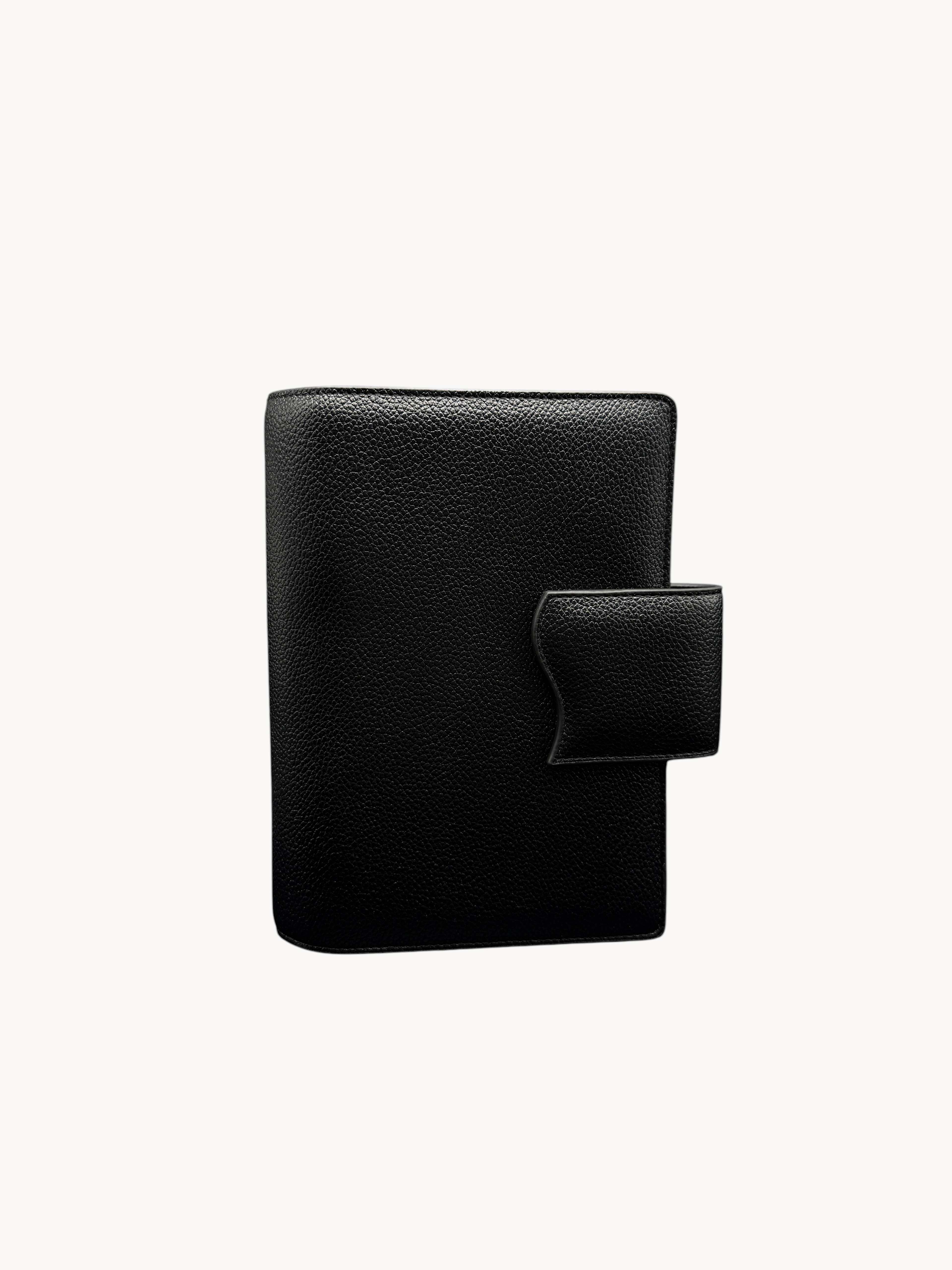 BUDGETNEEDS ™ A6 MiniFlap ring binder in black textured leather with a magnetic snap closure and pen holder.