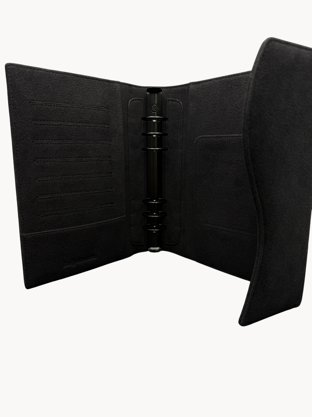 BUDGETNEEDS ™ black suede ring binder with internal card slots and a metal ring mechanism for organization.