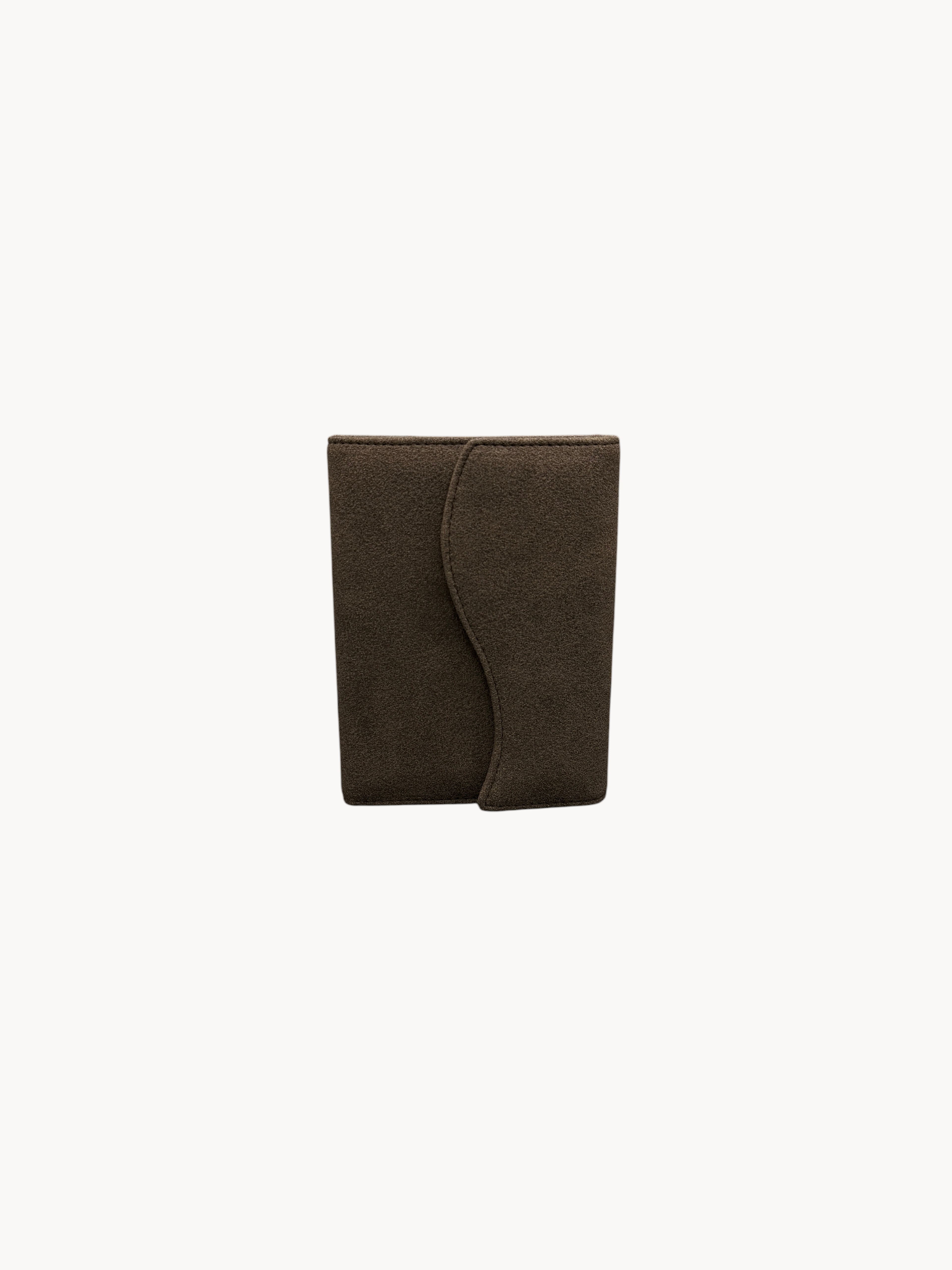BUDGETNEEDS ™ brown suede passport cover with a sleek curved flap design for stylish travel protection