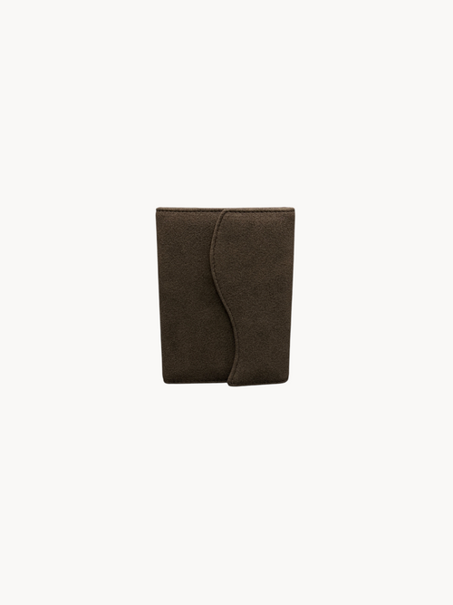 BUDGETNEEDS ™ brown suede passport cover with a sleek curved flap design for stylish travel protection