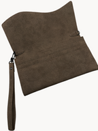 BUDGETNEEDS ™ brown suede wallet with a wrist strap and open interior compartments for cards and cash