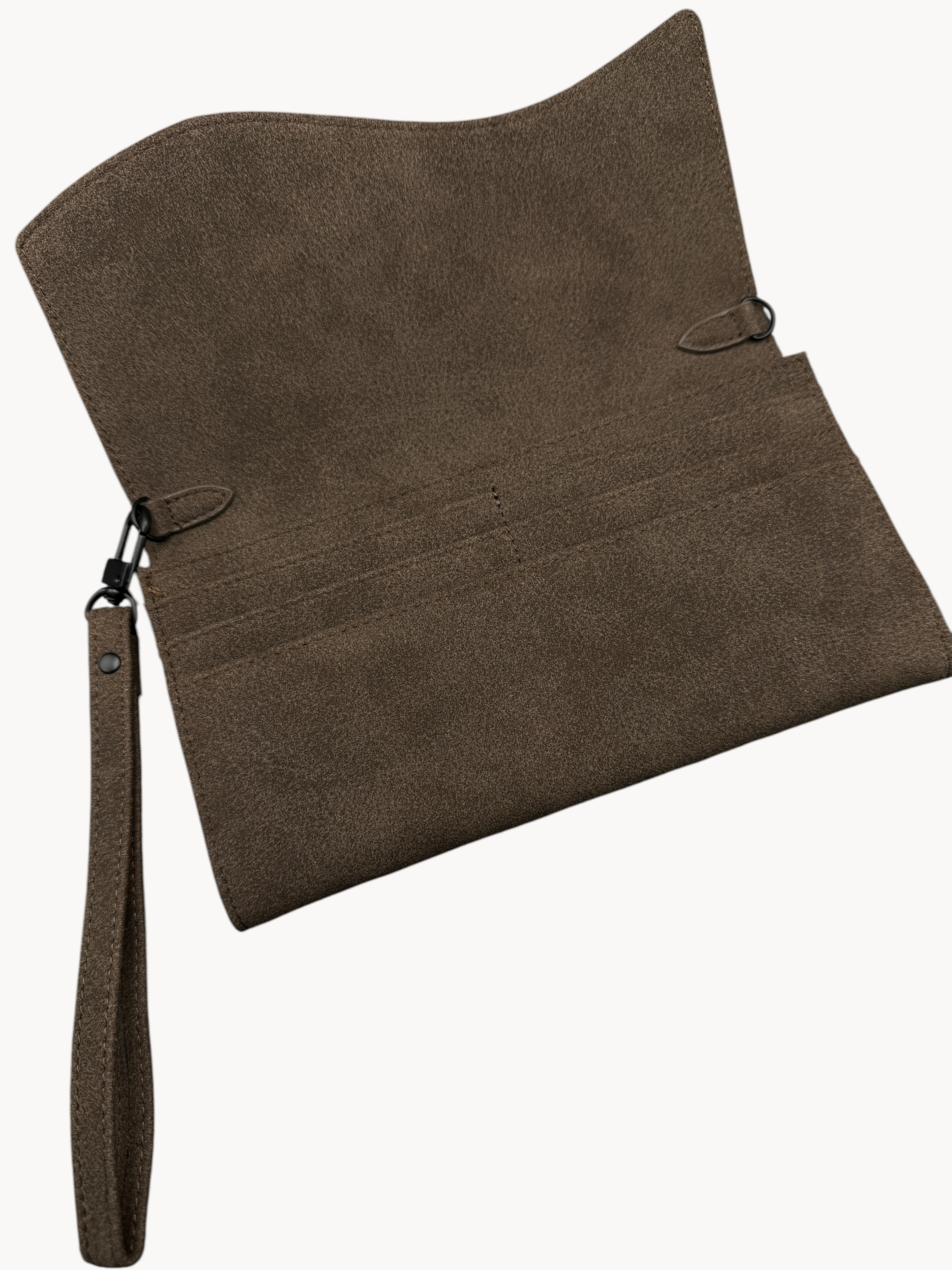 BUDGETNEEDS ™ brown suede wallet with a wrist strap and open interior compartments for cards and cash