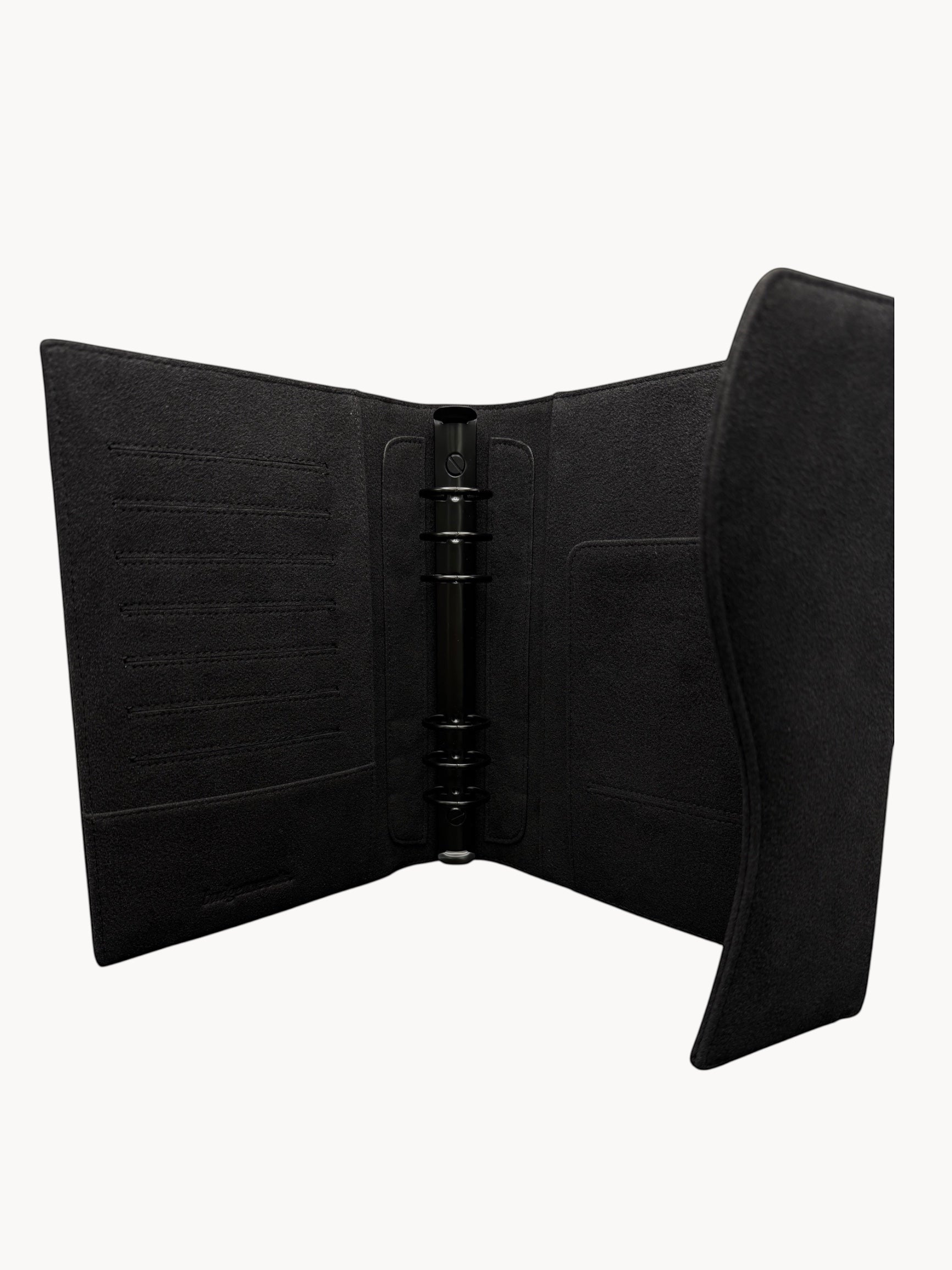 BUDGETNEEDS ™ FlapLine A5 ring binder in black suede with a 3cm ring mechanism and interior card slots.
