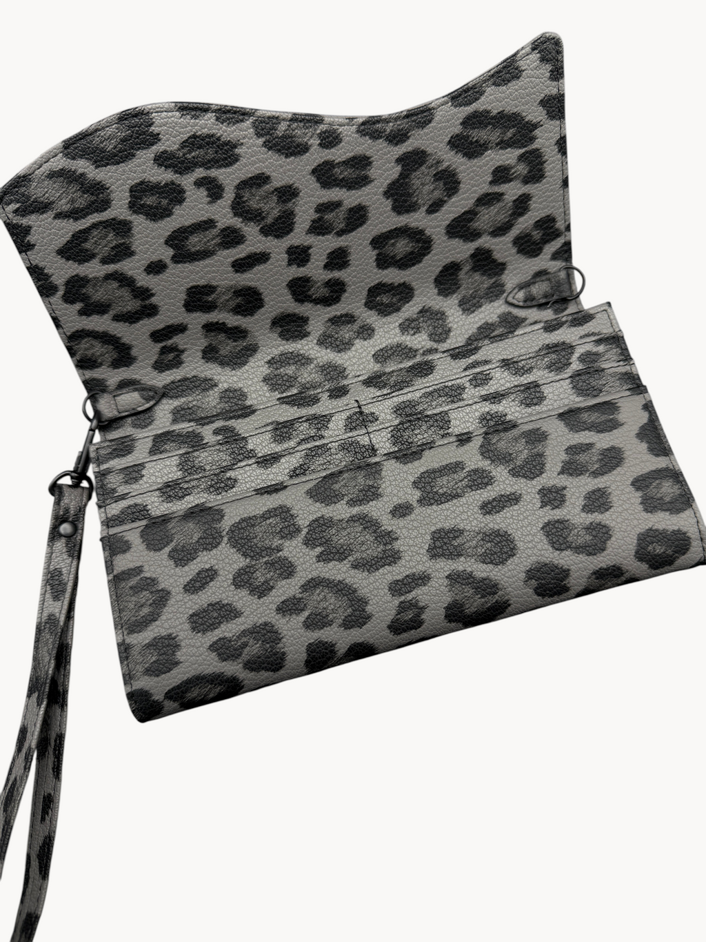 BUDGETNEEDS ™ leopard print suede wallet with wrist strap and open interior compartments