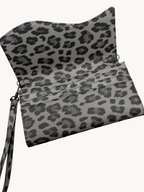 BUDGETNEEDS ™ leopard print suede wallet with wrist strap and open interior compartments