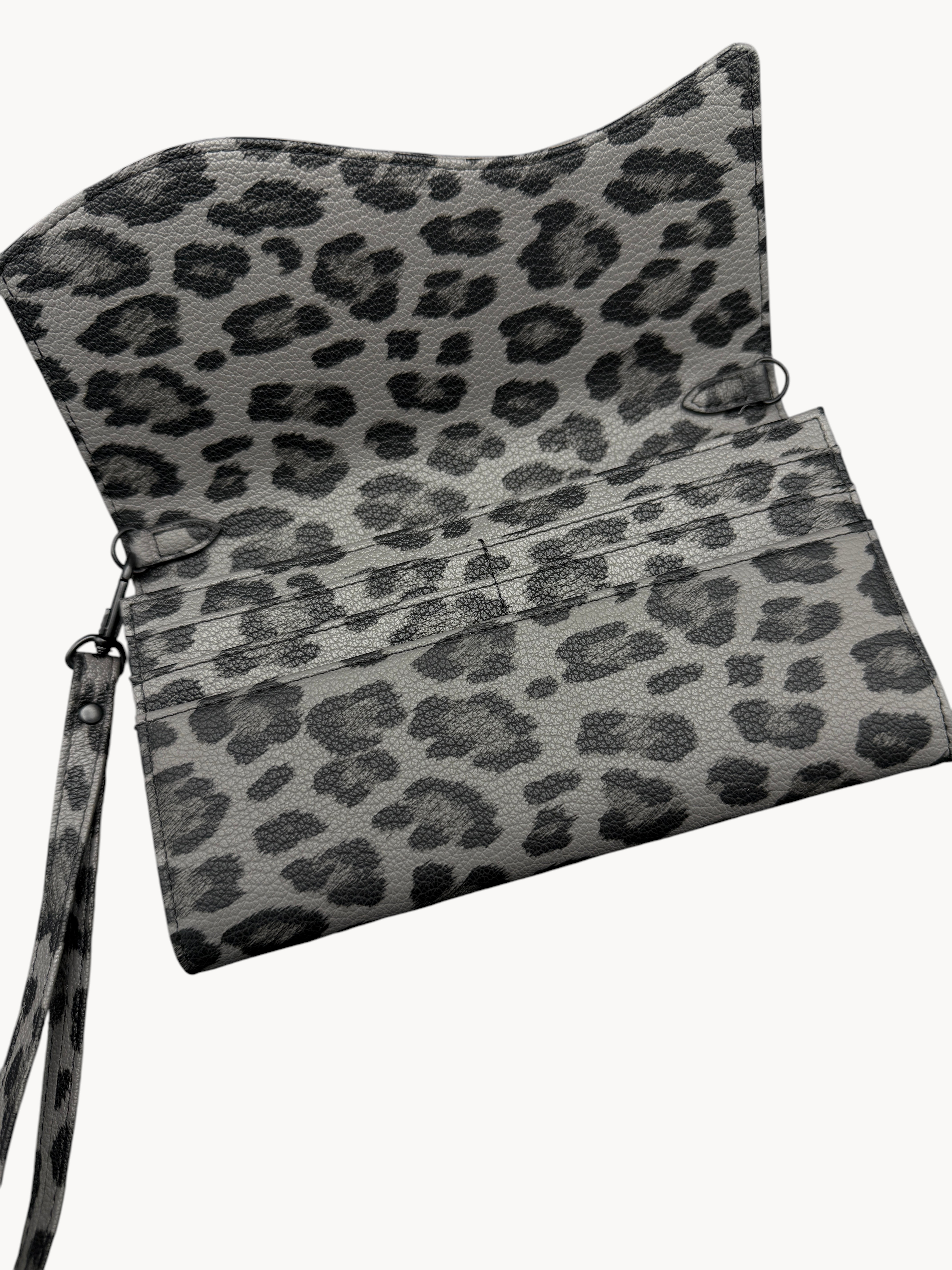 BUDGETNEEDS ™ leopard print suede wallet with wrist strap and open interior compartments