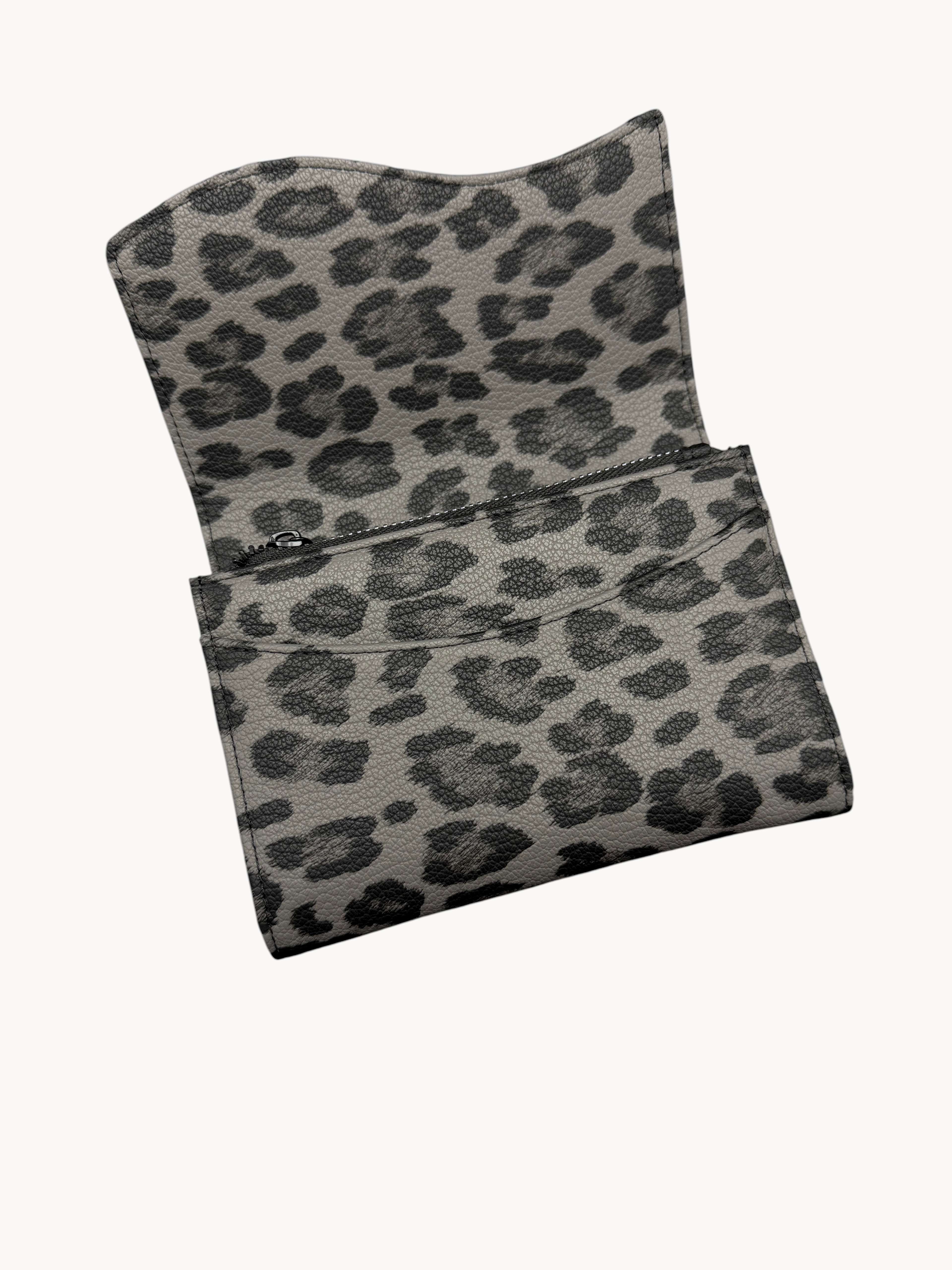 BUDGETNEEDS ™ Midi Wave clutch bag in grey leopard print leather with a wavy flap design and zipper closure