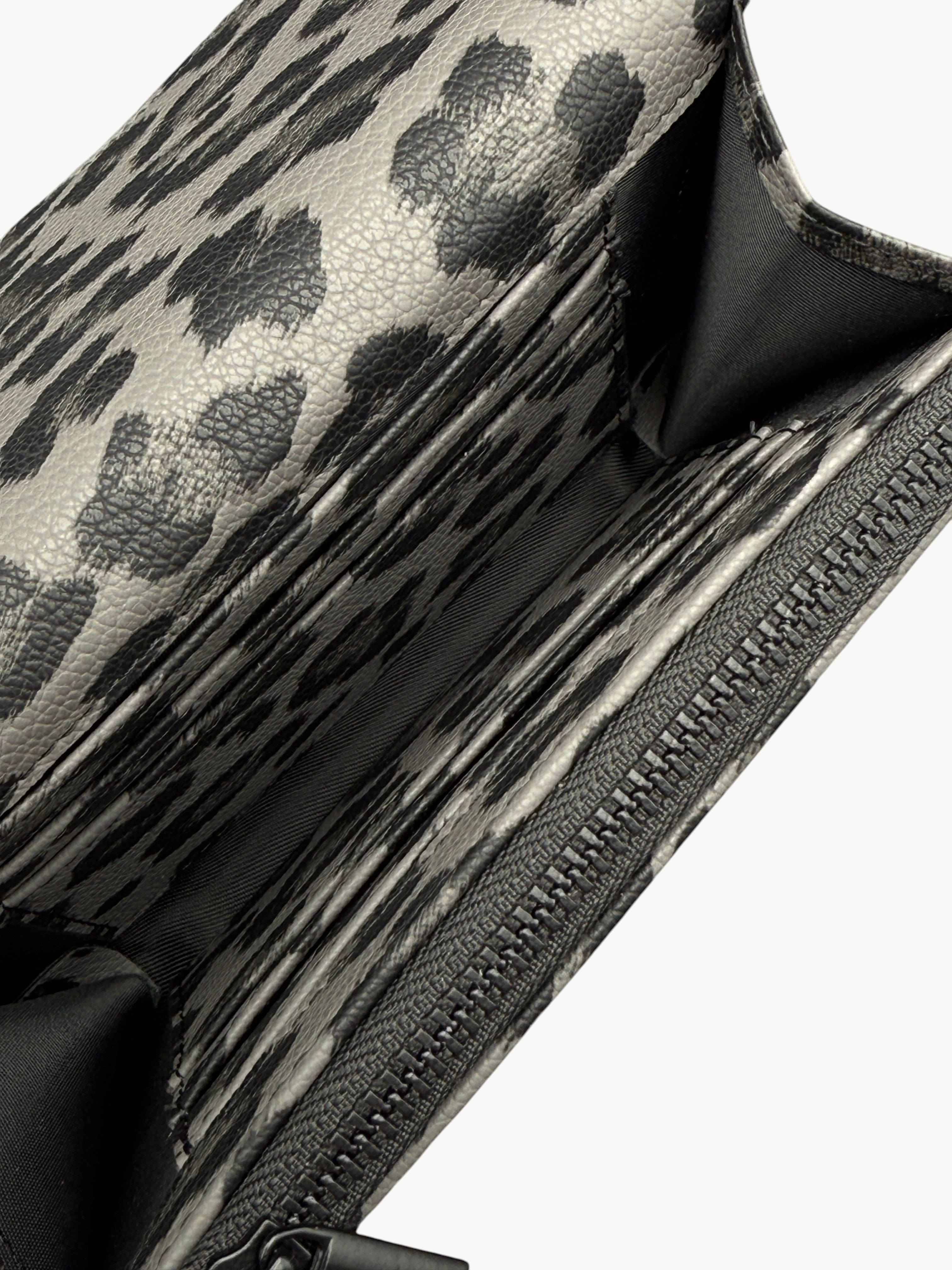 BUDGETNEEDS ™ Midi Wave wallet in grey leopard print with multiple card slots and a secure zipper closure