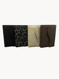 BUDGETNEEDS ™ passport covers in black, leopard print, beige, and brown, featuring a sleek, protective design.