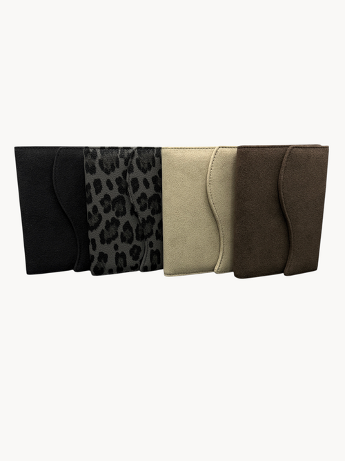 BUDGETNEEDS ™ passport covers in black, leopard print, beige, and brown, featuring a sleek, protective design.